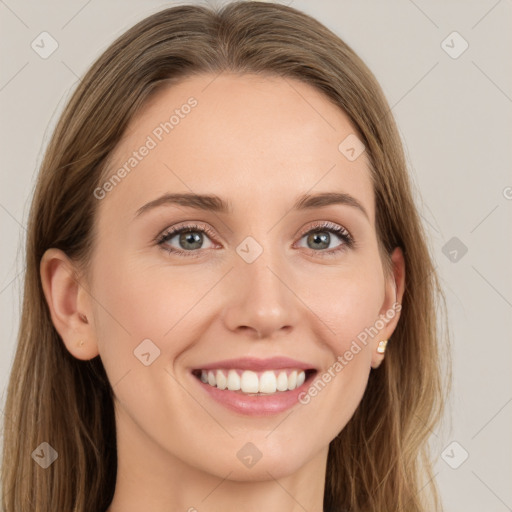 Joyful white young-adult female with long  brown hair and grey eyes