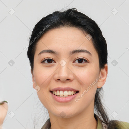 Joyful white young-adult female with medium  brown hair and brown eyes