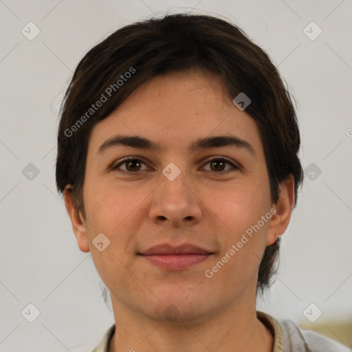 Joyful white young-adult female with short  brown hair and brown eyes