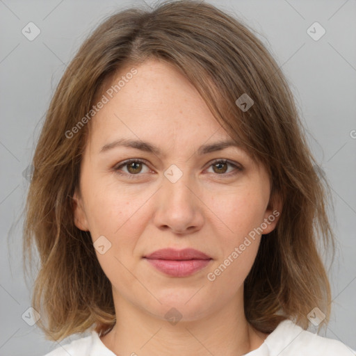 Joyful white adult female with medium  brown hair and brown eyes