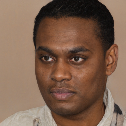 Neutral black young-adult male with short  black hair and brown eyes