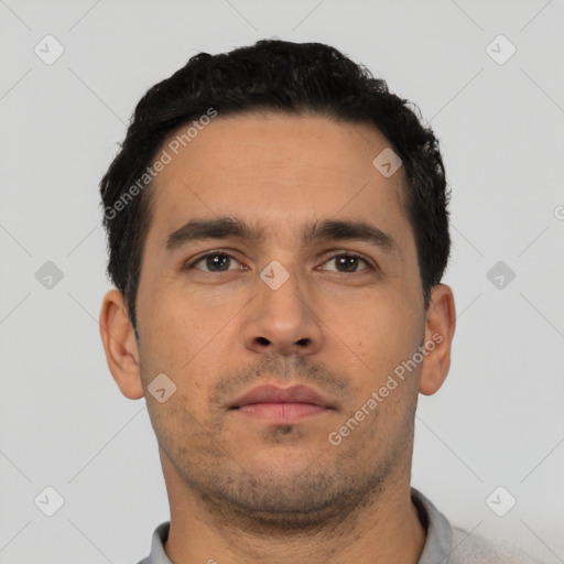 Neutral latino young-adult male with short  black hair and brown eyes