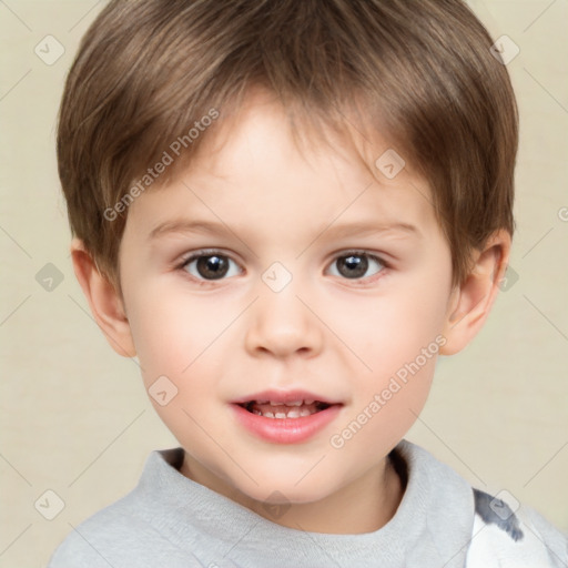 Joyful white child male with short  brown hair and brown eyes