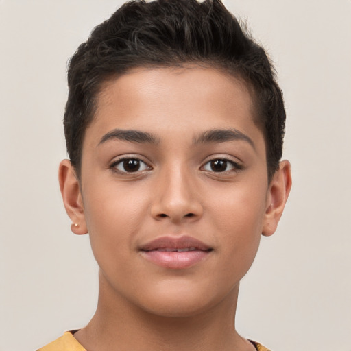 Joyful latino child female with short  brown hair and brown eyes