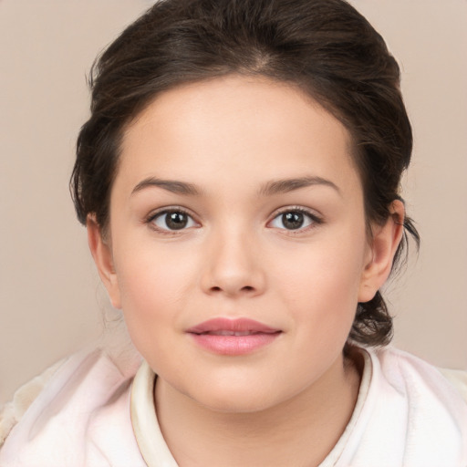 Joyful white child female with medium  brown hair and brown eyes