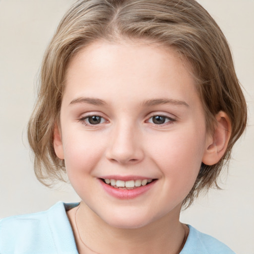 Joyful white child female with medium  brown hair and grey eyes