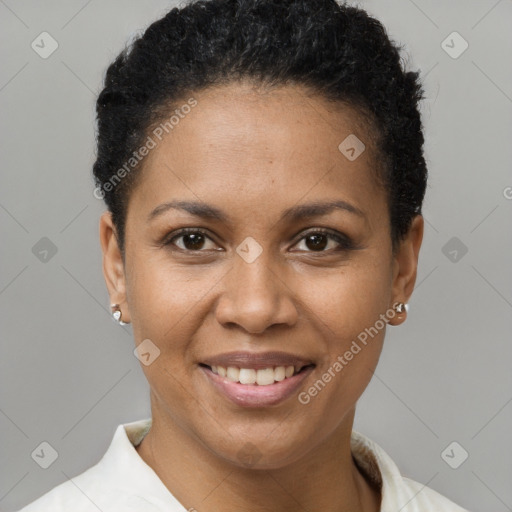 Joyful black young-adult female with short  brown hair and brown eyes