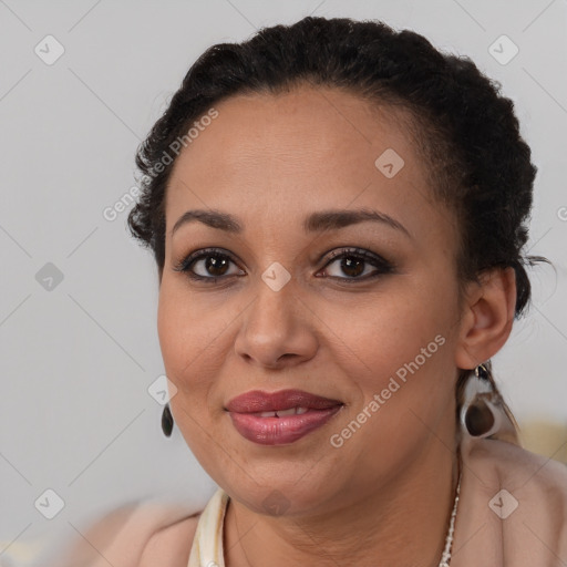 Joyful latino young-adult female with short  brown hair and brown eyes