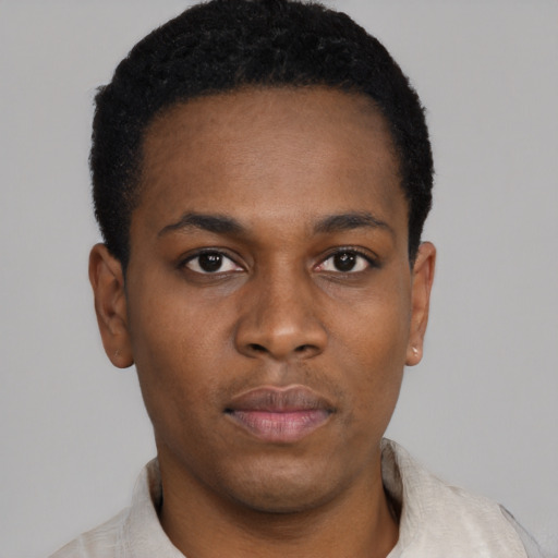 Neutral black young-adult male with short  black hair and brown eyes