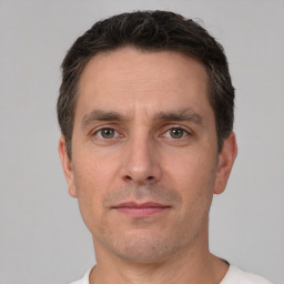 Neutral white adult male with short  brown hair and brown eyes