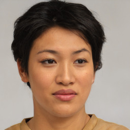 Joyful asian young-adult female with short  brown hair and brown eyes