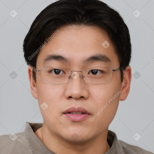 Neutral asian young-adult male with short  brown hair and brown eyes