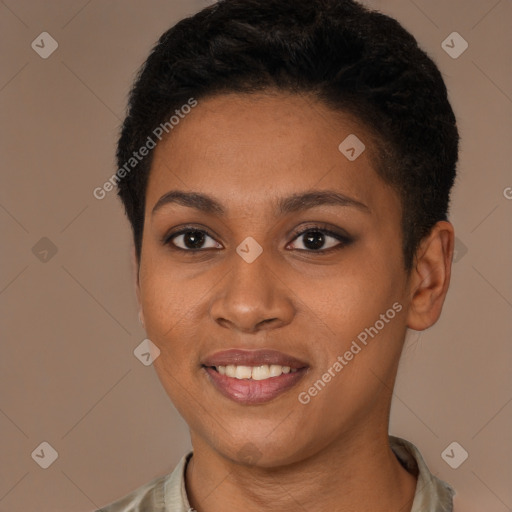 Joyful black young-adult female with short  brown hair and brown eyes