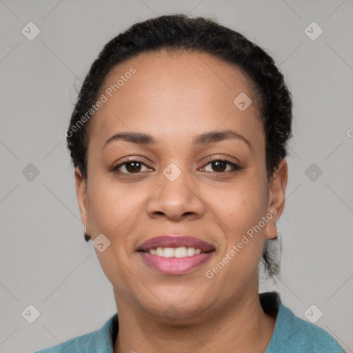 Joyful latino adult female with short  brown hair and brown eyes