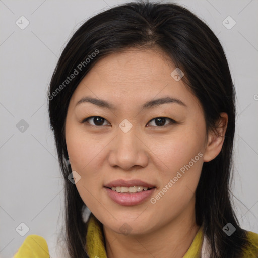 Joyful asian young-adult female with medium  brown hair and brown eyes