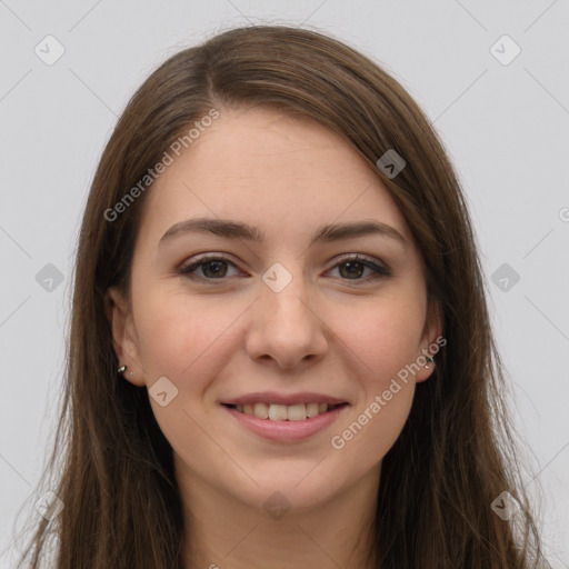 Joyful white young-adult female with long  brown hair and grey eyes