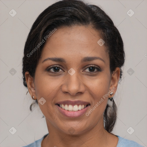 Joyful black young-adult female with medium  brown hair and brown eyes