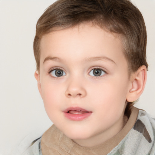 Joyful white child female with short  brown hair and brown eyes