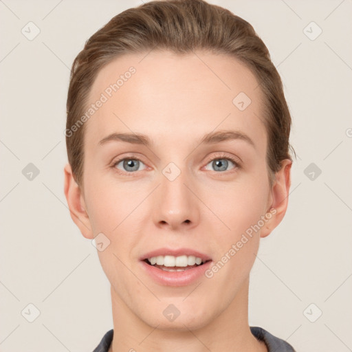 Joyful white young-adult female with short  brown hair and grey eyes