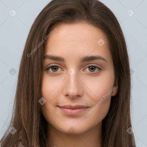 Neutral white young-adult female with long  brown hair and brown eyes