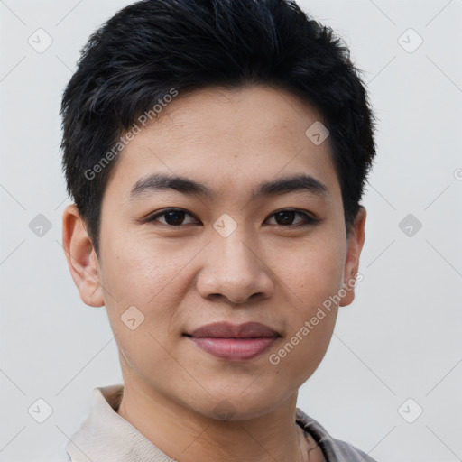 Joyful asian young-adult male with short  black hair and brown eyes