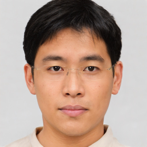 Neutral asian young-adult male with short  brown hair and brown eyes