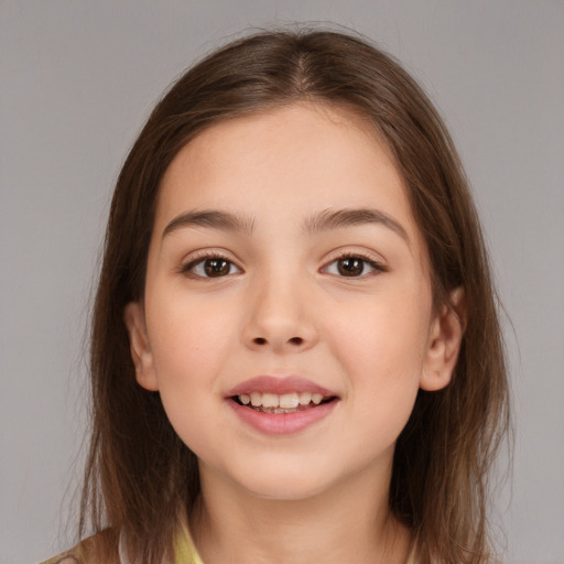 Joyful white child female with medium  brown hair and brown eyes