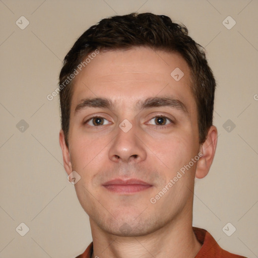 Neutral white young-adult male with short  brown hair and brown eyes