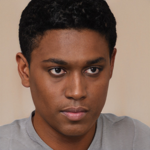 Neutral black young-adult male with short  brown hair and brown eyes