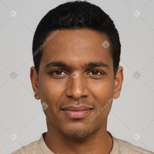 Joyful black young-adult male with short  black hair and brown eyes