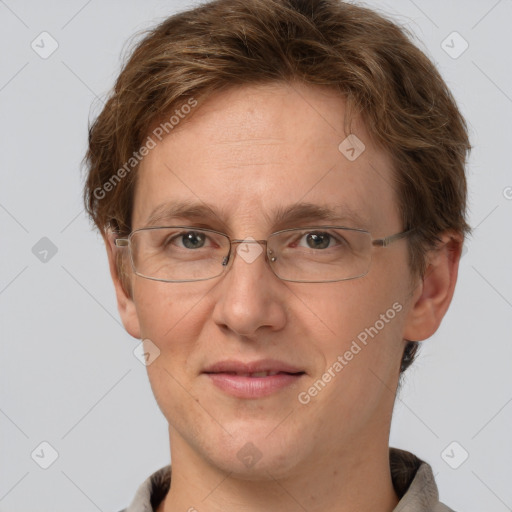 Joyful white adult female with short  brown hair and grey eyes