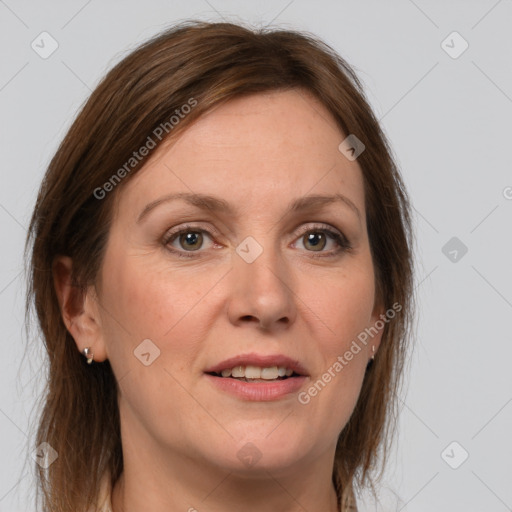 Joyful white adult female with medium  brown hair and grey eyes