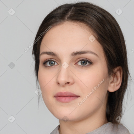 Neutral white young-adult female with medium  brown hair and brown eyes