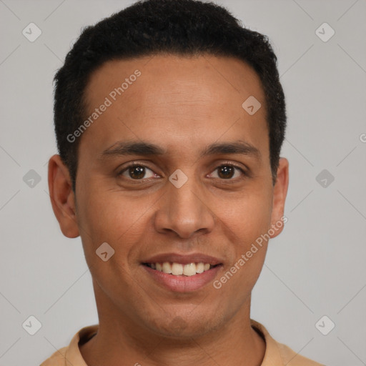 Joyful latino young-adult male with short  black hair and brown eyes