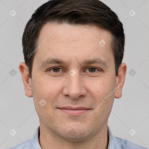 Joyful white adult male with short  brown hair and grey eyes