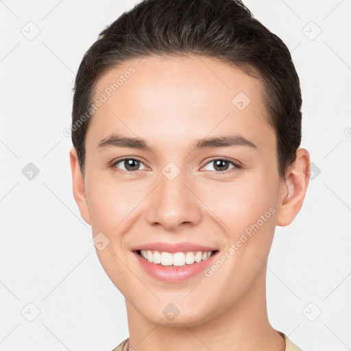 Joyful white young-adult female with short  brown hair and brown eyes