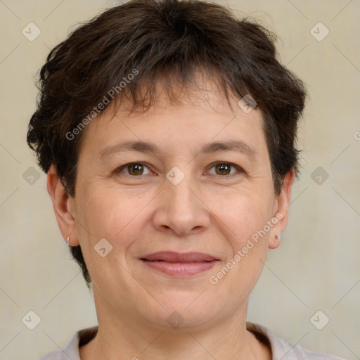 Joyful white adult female with short  brown hair and brown eyes