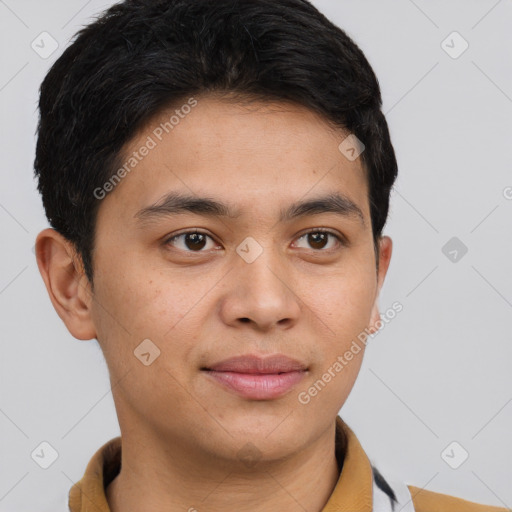 Joyful latino young-adult male with short  brown hair and brown eyes
