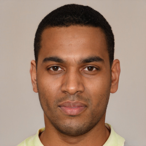 Neutral black young-adult male with short  black hair and brown eyes