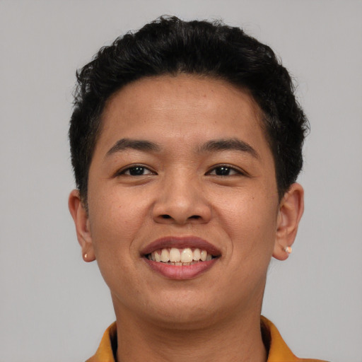 Joyful asian young-adult female with short  brown hair and brown eyes