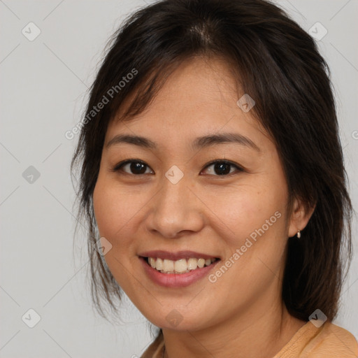 Joyful white young-adult female with medium  brown hair and brown eyes