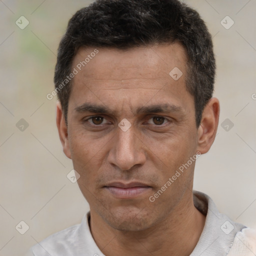 Neutral white adult male with short  black hair and brown eyes