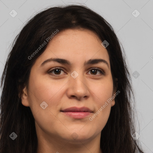 Joyful latino young-adult female with long  brown hair and brown eyes