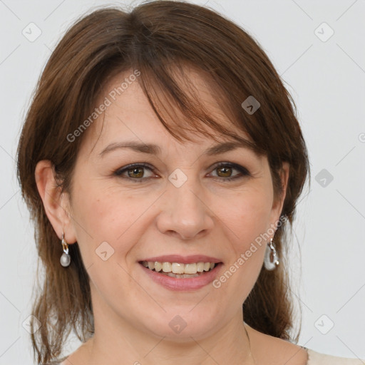 Joyful white adult female with medium  brown hair and grey eyes