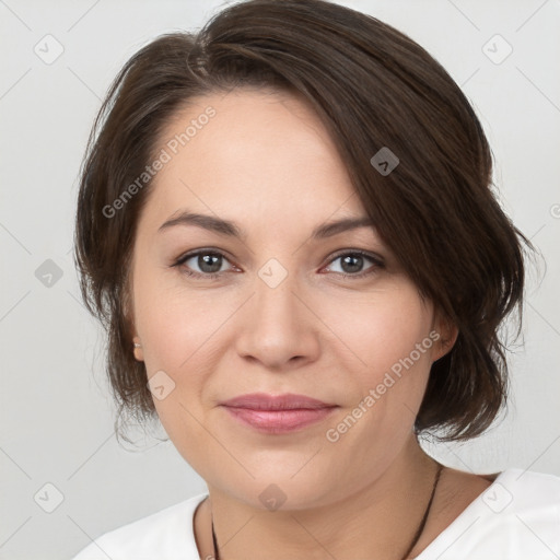 Joyful white young-adult female with medium  brown hair and brown eyes