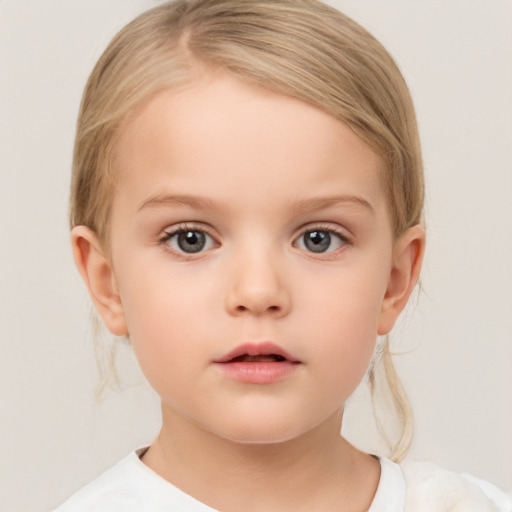 Neutral white child female with medium  brown hair and brown eyes