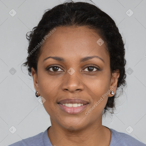 Joyful black young-adult female with medium  black hair and brown eyes