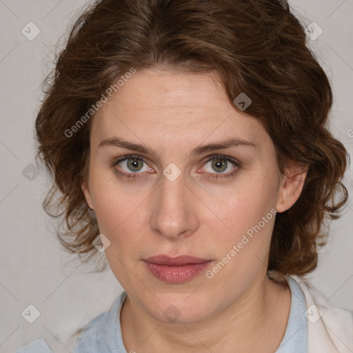 Joyful white young-adult female with medium  brown hair and green eyes