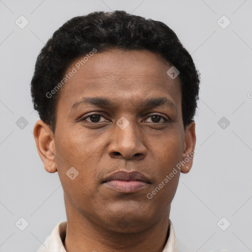 Neutral latino young-adult male with short  brown hair and brown eyes