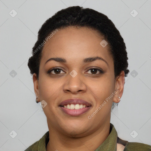 Joyful latino young-adult female with short  black hair and brown eyes